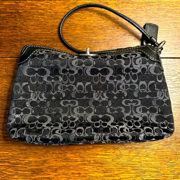 COACH wristlet with turn lock closure. Black and silver - Picture 1 of 9